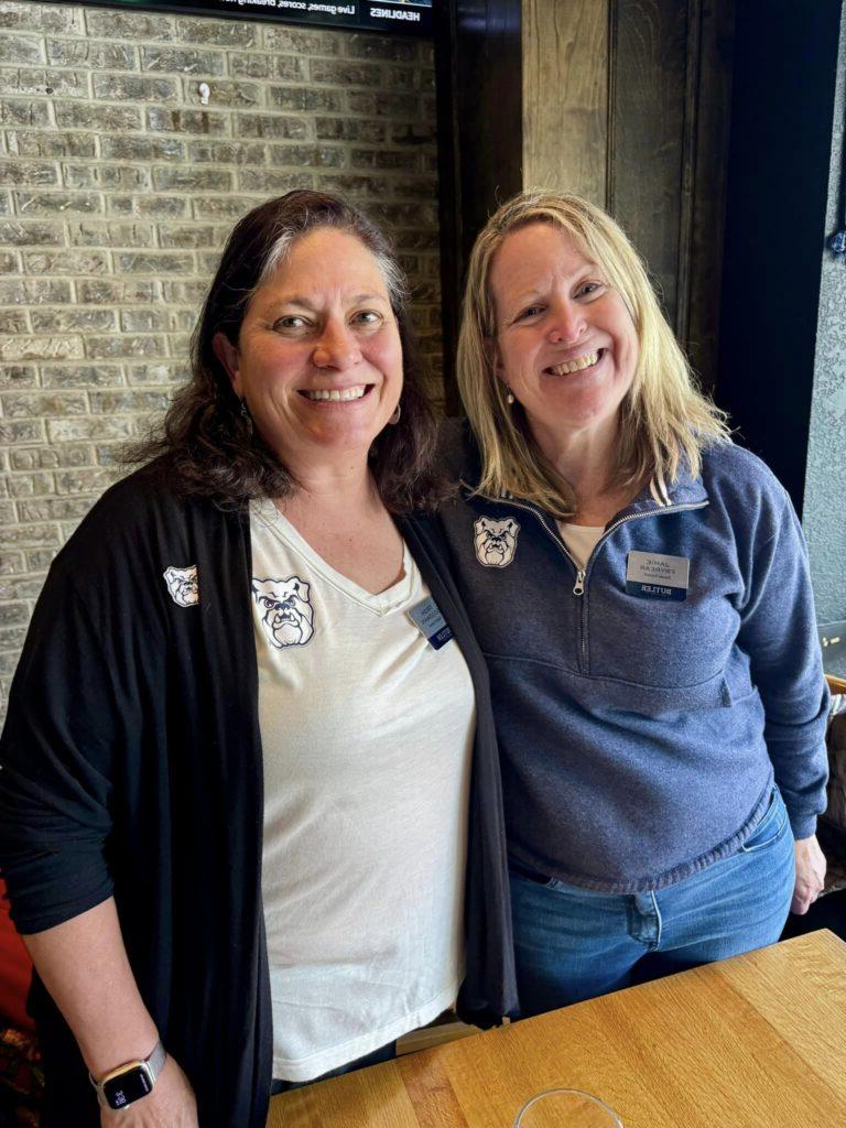 Family Council members pose next to each other in Chatham Tap